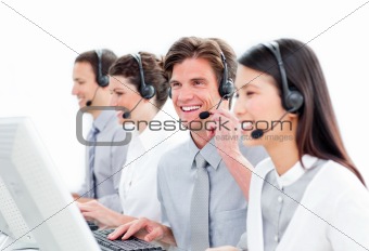 Portrait of charismatic customer service agents working in a cal