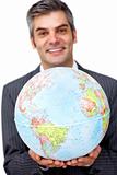 Mature businessman holding a terrestrial globe 