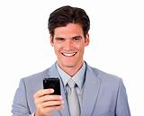 Portrait of a serious businessman on phone against a white background