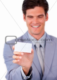 Charming businessman holding a white card 