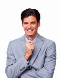 Laughing businessman holding glasses 