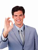 Successful businessman showing OK sign 