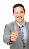 Cheerful businessman with thumb up 