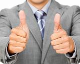 Close-up of a businessman with thumbs up