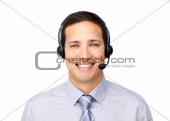 Smiling businessman talking on headset 