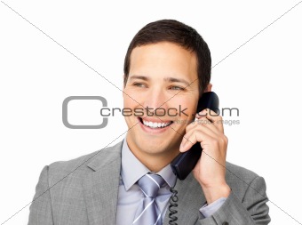 Confident young businessman talking on phone 