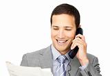 Charsmatic businessman on phone holding a newspaper 