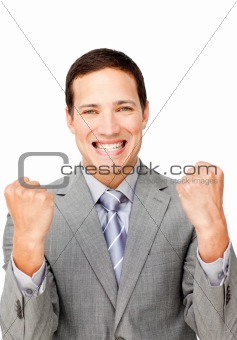 Charismatic businessman punching the air in celebration 