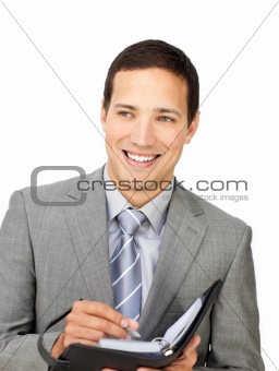 Attractive young businessman holding an agenda 