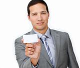 Confident male executive holding a white card 