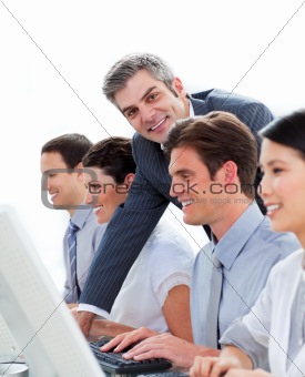 Self-assured manager working with his team 