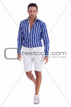 Young guy in  casual wear ready to walk
