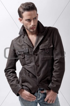 Young male model with brown jacket