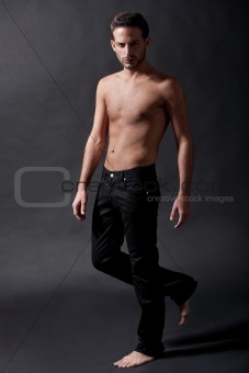 Fashion male model with black jean