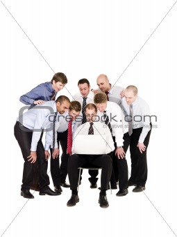 Businessmen in front of a laptop