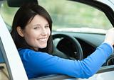 Portrait of a smiling woman driving 