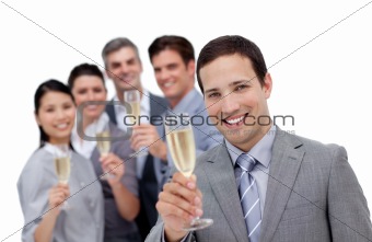 Cheerful business team toasting with Champagne 