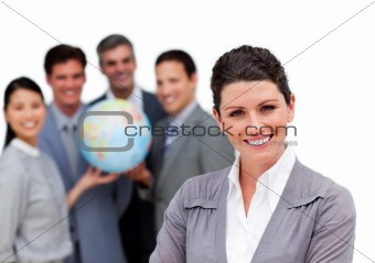 Ambitious business team holding a terrestrial globe