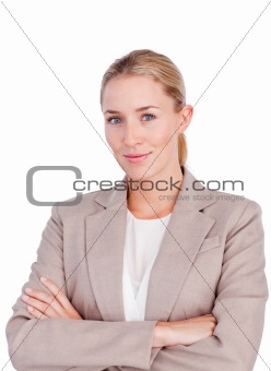 Confident female executive with folded arms 