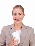Positive businesswoman drinking a coffee 