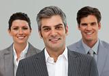 Smiling Business associates standing in a line