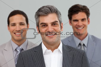 Happy businessman with his team