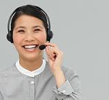 Asian customer service agent with headset on