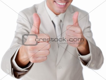 Close-up of a businessman with thumbs up 