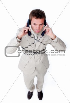 Bored businessman tangle up in phone wires 
