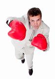 Competitive businessman using boxing gloves