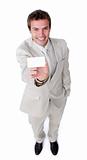 Assertive caucasian businessman holding a white card 