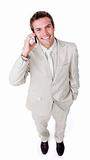 Positive businessman using a mobile phone 