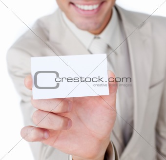 Close-up of a businessman holding a white card 