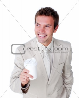Smiling businessman holding a drinking cup 
