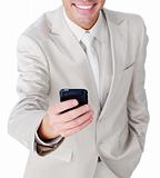 Close-up of a businessman sending a text 