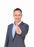 Cheerful businessman with thumb up 