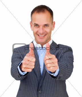 Successful businessman with thumbs up 