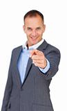 Charismatic businessman pointing at the camera 