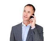 Confident mature businessman talking on phone 