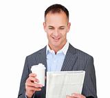 Attractive businessman holding a drinking cup 