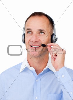 Customer service agent with headset on looking upward 
