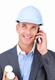 Cheerful male architect talking on phone 
