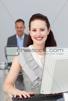 Sparkling businesswoman smiling at the camera 