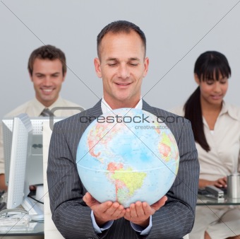 Assertive manager smiling at global expansion 