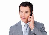 Portrait of a confident businessman on phone 
