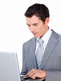 Caucasian businessman using a laptop 