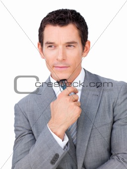 Confident businessman holding glasses 