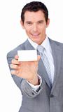 Charismatic businessman showing a white card 