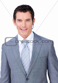 Confident male executive with headset on 