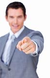 Positive businessman pointing at the camera 